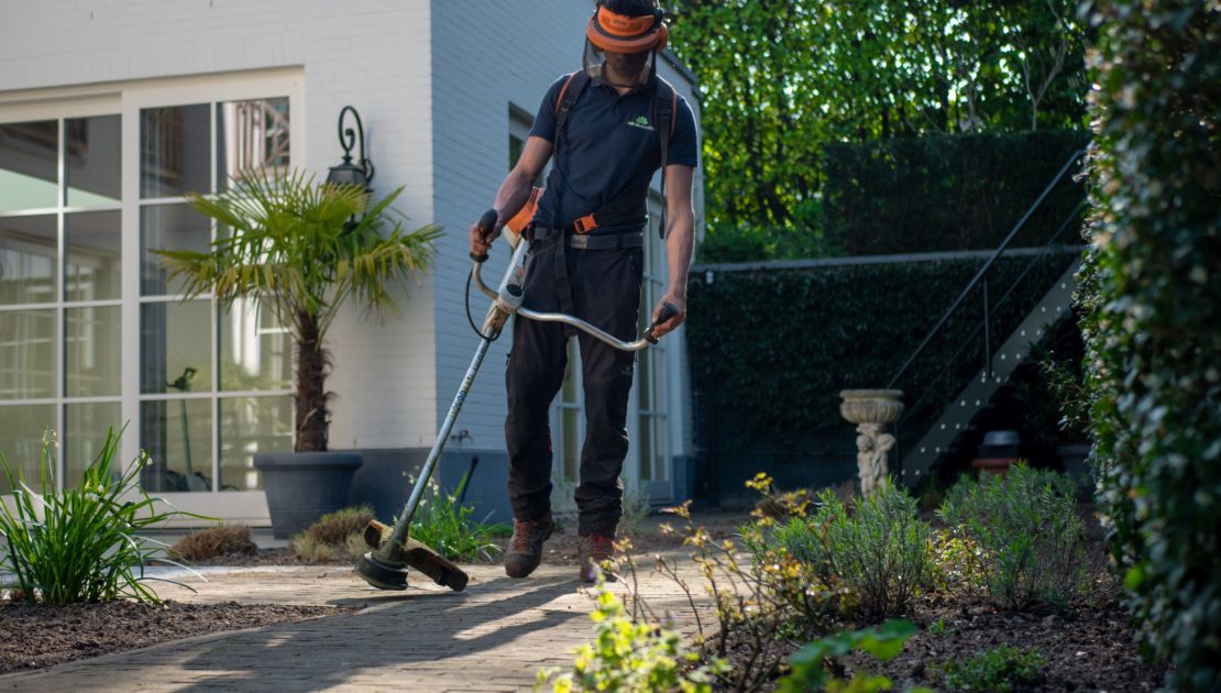 landscaper working in the morning